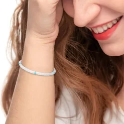Sale Bracciale con dischetti conchiglie bianche e turchesi Bracciali